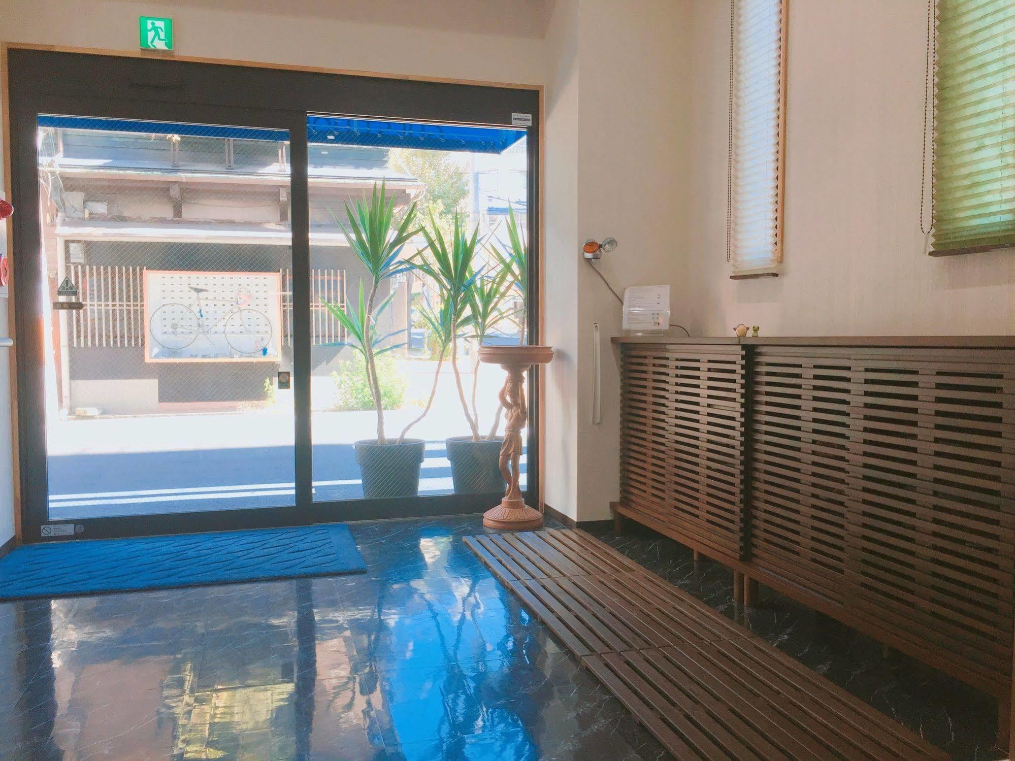 Guest House Gloire Osaka Exteriör bild